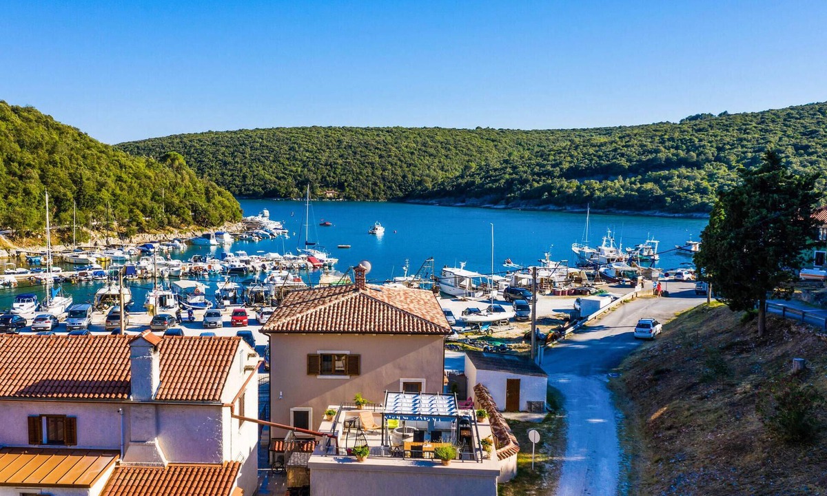 Rakalj House | Beach front home in Krnica with WiFi