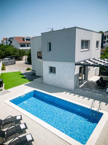 Brodarica Villa | Villa Lumaka Sun - Amazing Home In Brodarica with 4 Bedrooms, Wifi, Outdoor Swimming Pool and Heated Swimming Pool