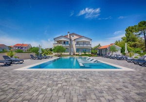 Holiday apartment Modern with pool, quiet location, lake view for 4 people