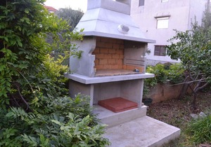 Holiday apartment with balcony and air conditioning