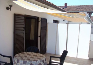 Holiday apartment with balcony and air conditioning