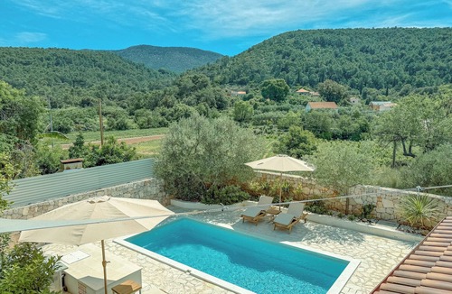 Dol Villa | Modern expression of a traditional Hvar stone house amidst sunny nature.