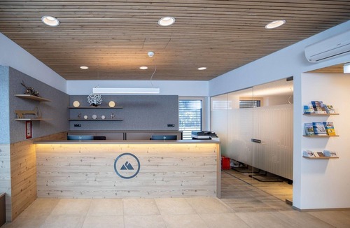 Hinterstoder Apartment | Modern studio with living and sleeping area.