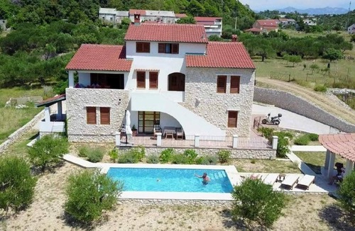 Barbat na Rabu Apartment | Two bedroom apartment with a swimming pool Barbat, Rab (A-22358-a)