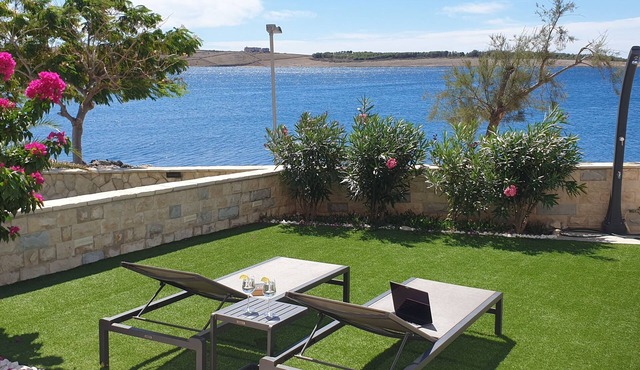 A beautiful two-story apartment located directly by the sea