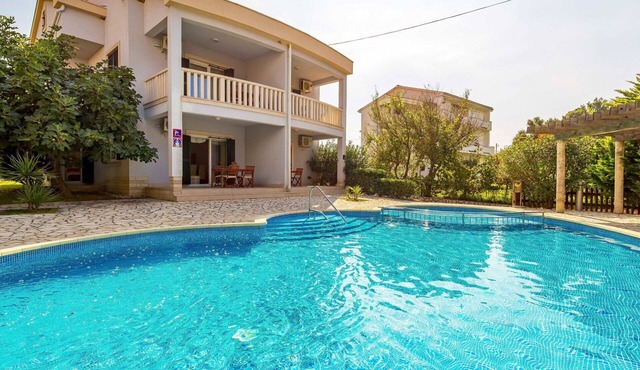 Beautiful apartment for 4 people with pool, WIFI, A/C, TV and patio