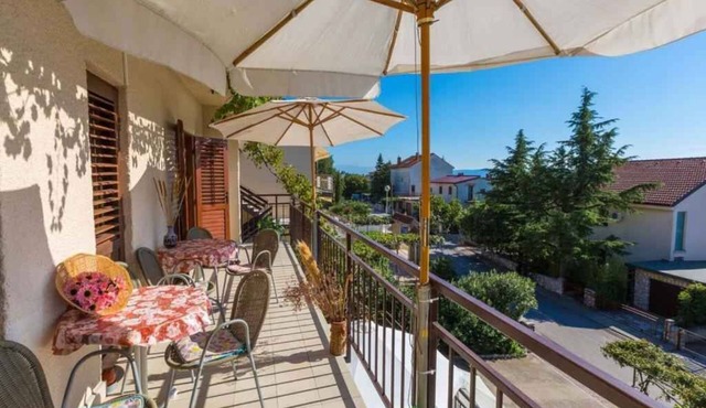 Holiday apartment with air conditioning and balcony