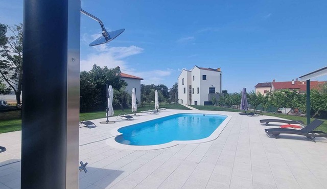 Holiday apartment with air conditioning and outdoor pool