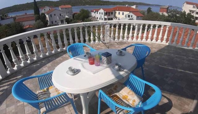 Holiday apartment with terrace and air conditioning