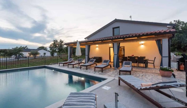 Holiday home With a large garden pool