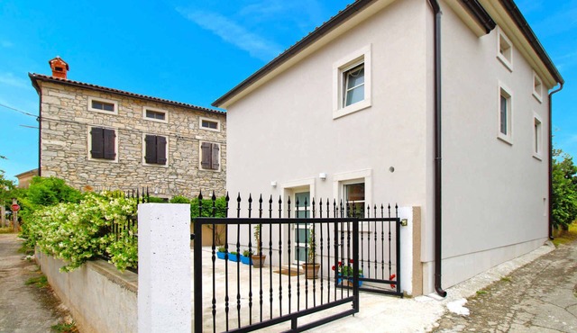 Holiday home with large terrace and barbecue