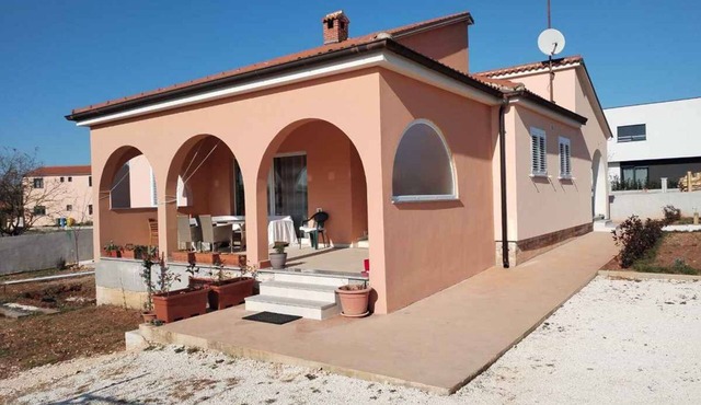 Holiday home with terrace and barbecue