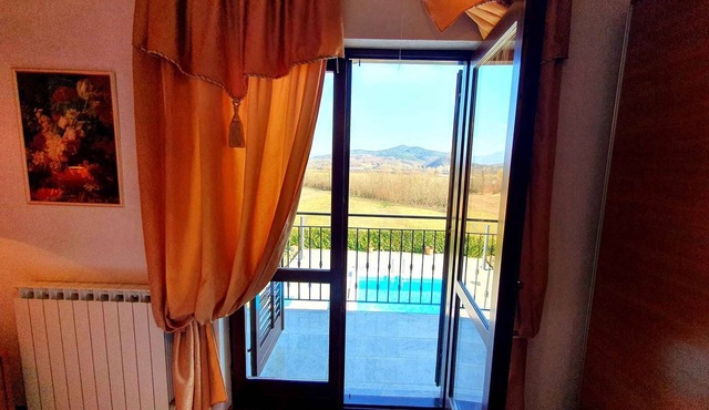 Holiday house with outdoor pool, balcony and close to the beach