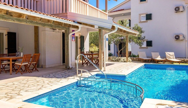 Lovely apartment for 4 people with A/C, pool, WIFI, TV and balcony