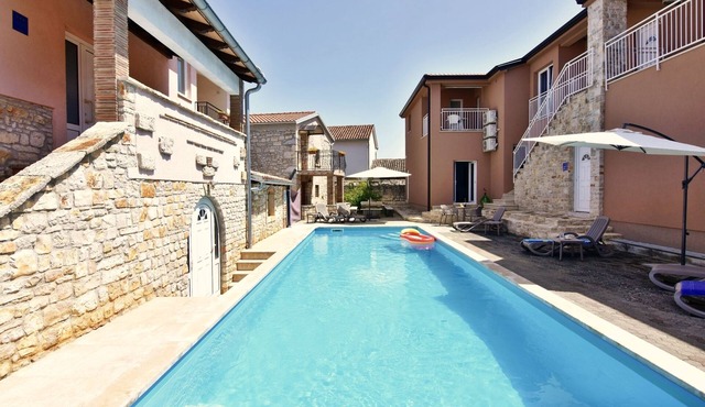 NOA2 Apartment in Poreč-Tar with a pool, balcony, game room, Wi-Fi, and barbecue