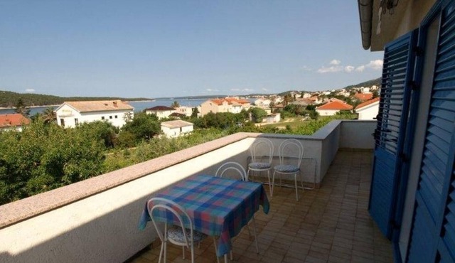 Two bedroom apartment with terrace and sea view Barbat, Rab (A-16992-b)