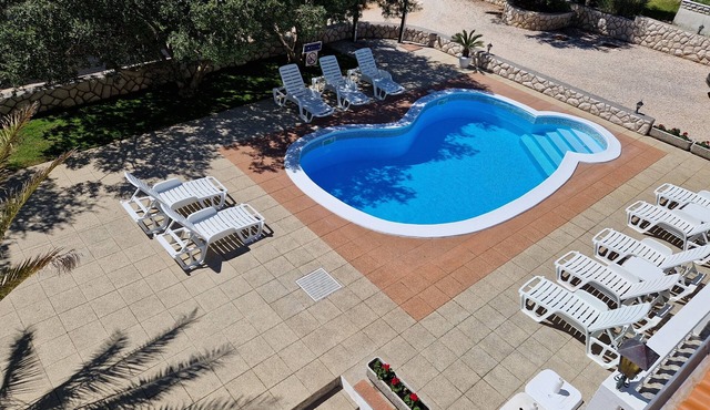 Two bedroom apartment with a swimming pool Barbat, Rab (A-4951-a)