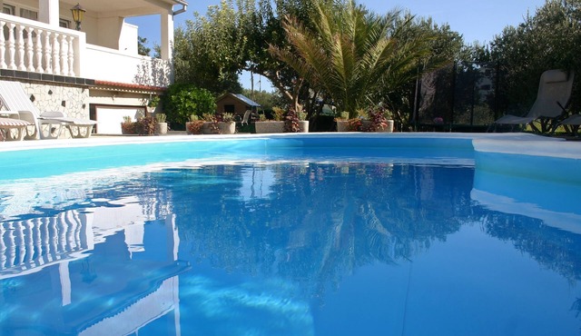 Two bedroom apartment with a swimming pool Barbat, Rab (A-4951-e)