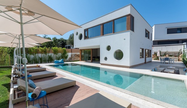 Villa near beach wih 12 meters long pool, walking distance to the beach