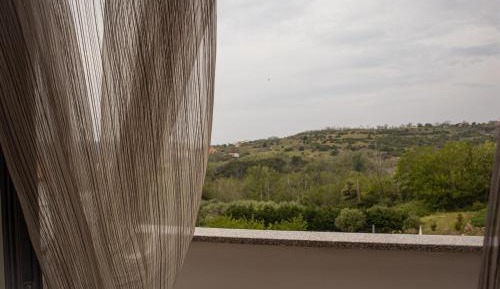 Two-Bedroom Apartment with Balcony
