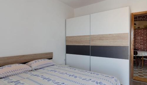 Three-Bedroom Apartment with Terrace and Sea View