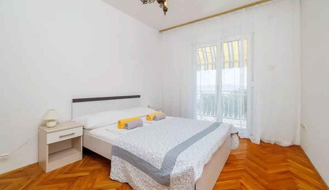 Holiday apartment with balcony and air conditioning